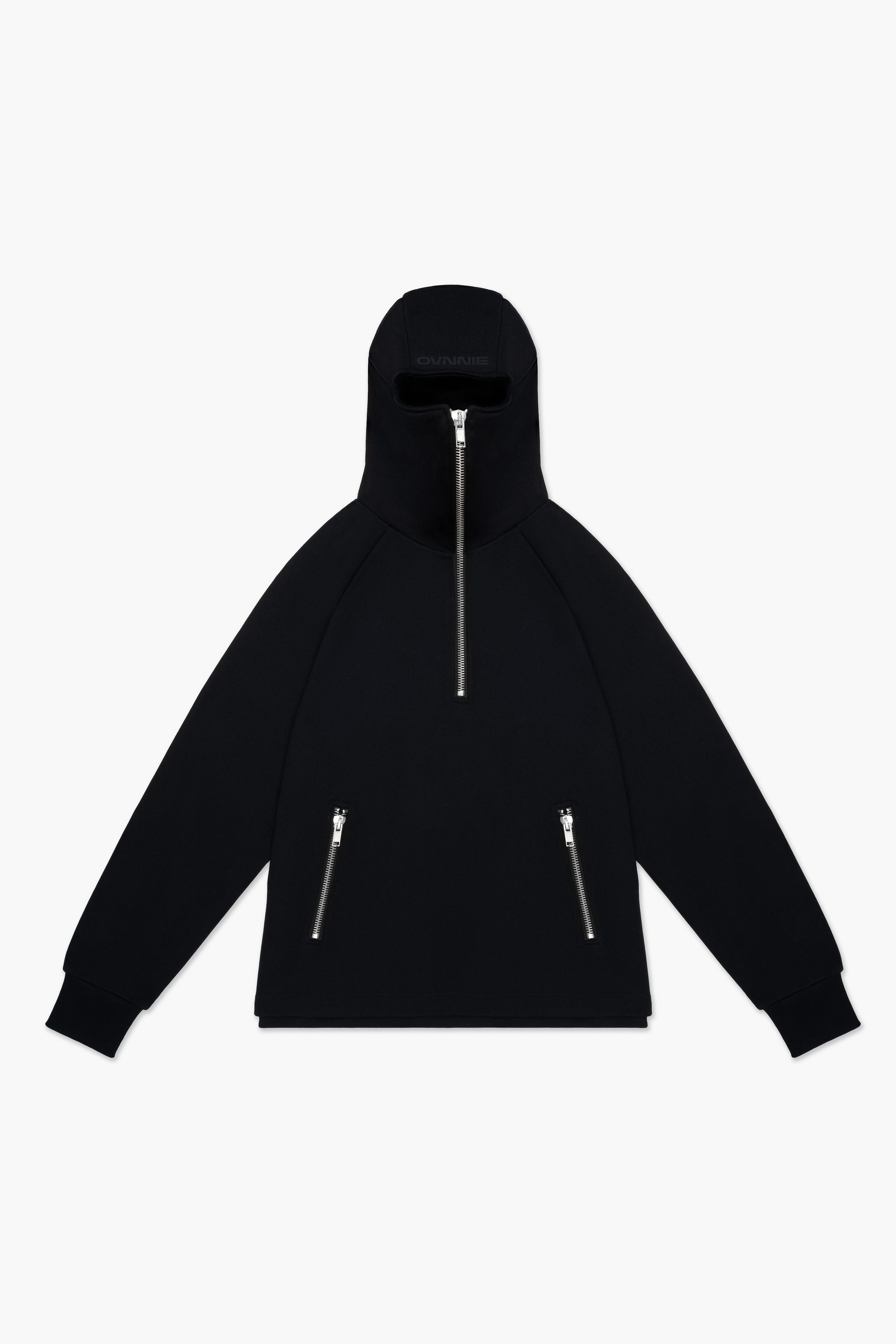 Front of black balaclava hoodie zipped all the way up ovnnie