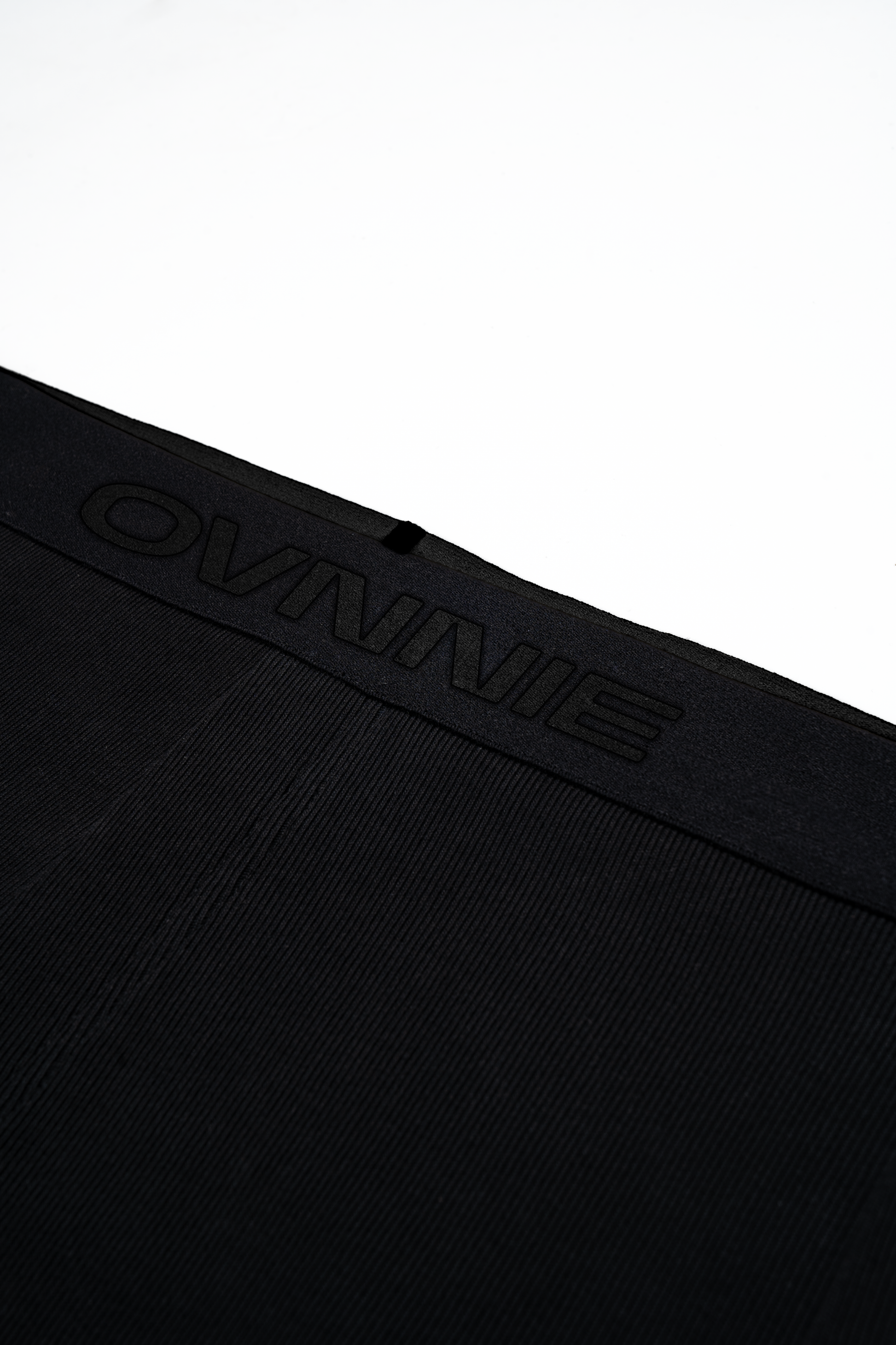 Close up of elastic detailing on black leggings